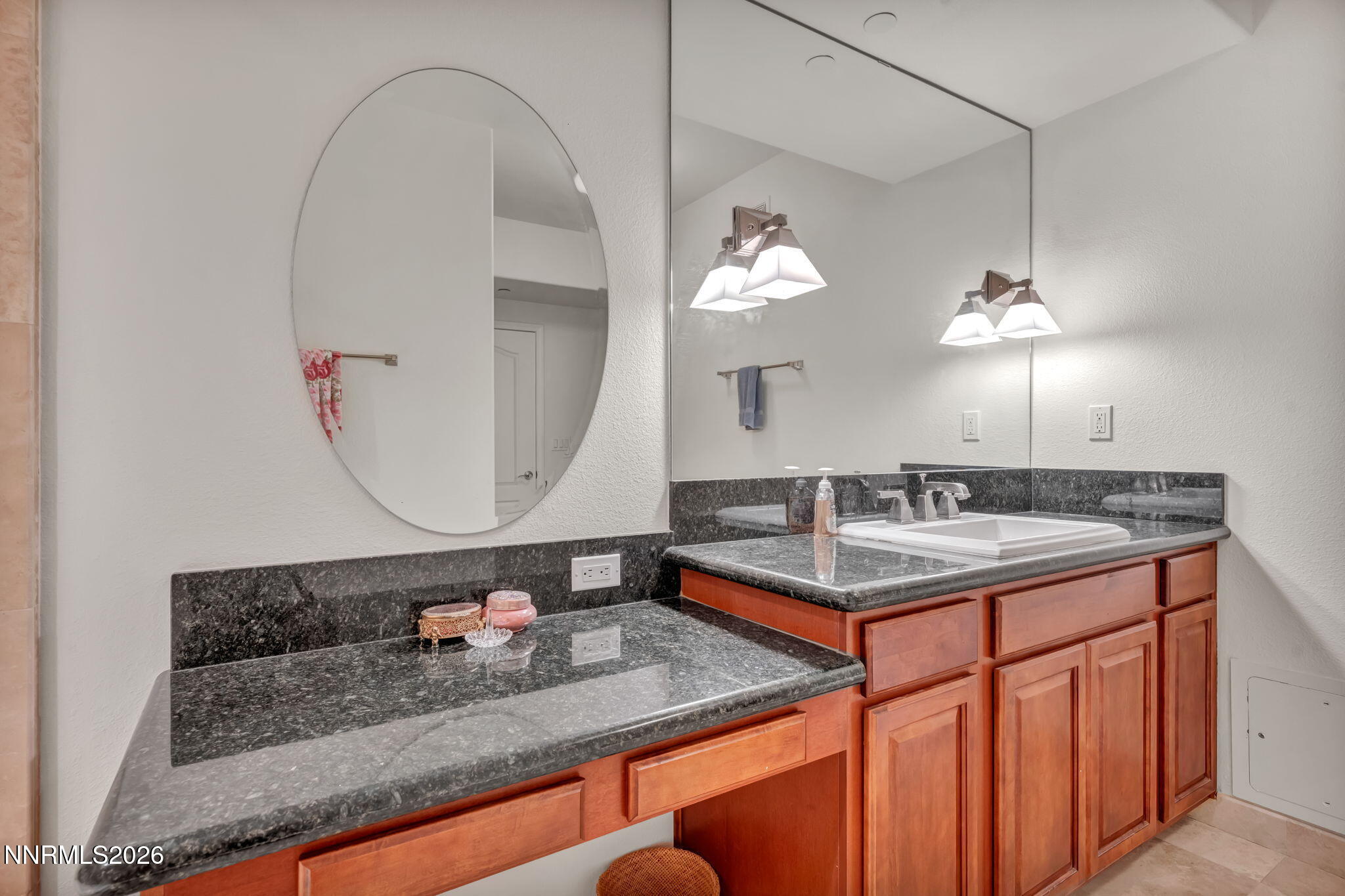 200 West 2nd Street, Unit 1103 Reno, NV 89501 - Photo 26 of 49 a bathroom with a sink and a mirror