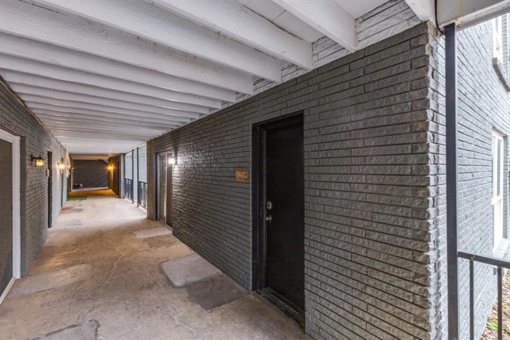 811 Skillman Street, Unit 105 Dallas, TX 75214 - Photo 13 of 13 a view of a hallway