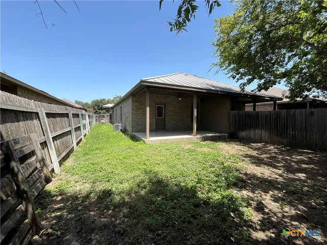 a house with trees in front of it