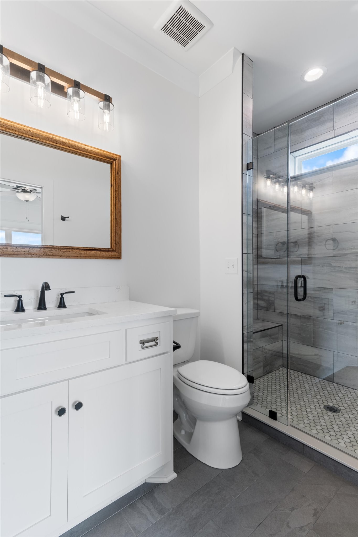 926 Cortner Road Normandy, TN 37360 - Photo 54 of 59 a bathroom with a sink a toilet and shower