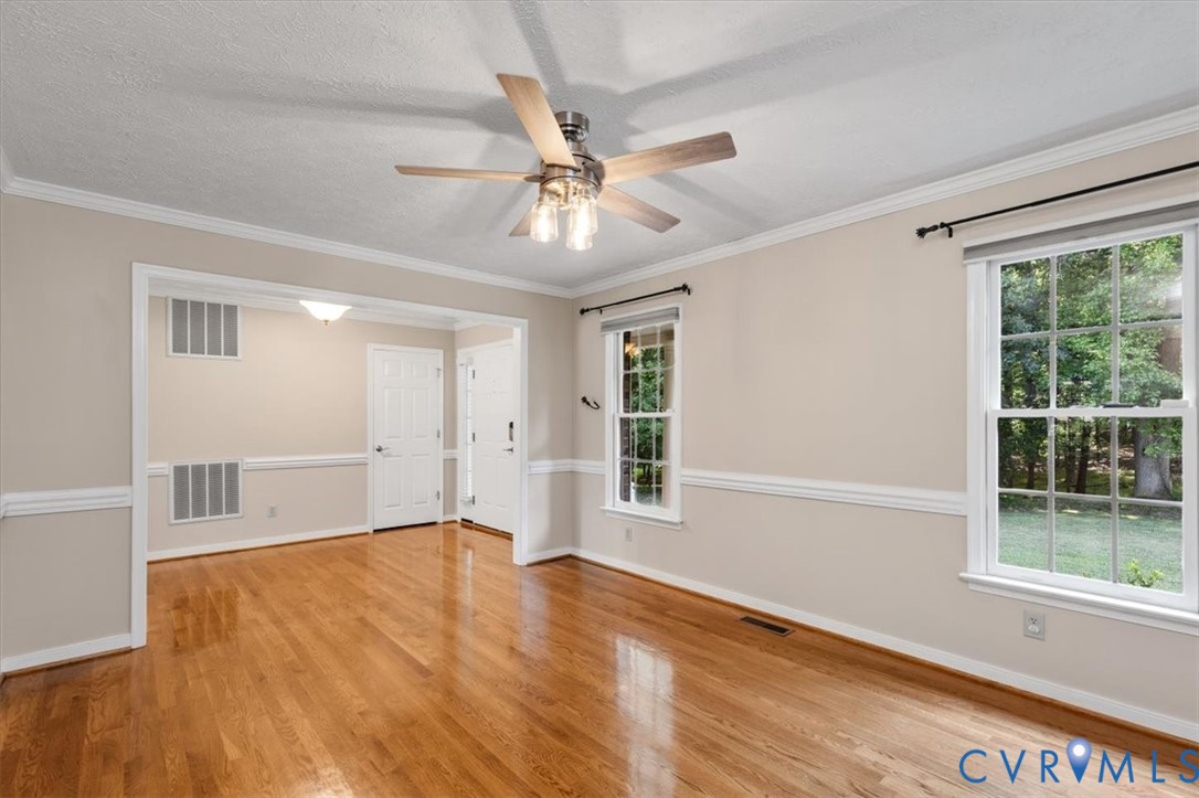 1437 Palmore Road Powhatan, VA 23139 - Photo 9 of 60 Spacious room featuring wood-finish flooring, whit