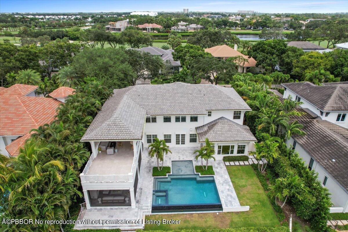159 Commodore Drive Jupiter, FL 33477 - Photo 15 of 20 an aerial view of a house with yard porch and furniture