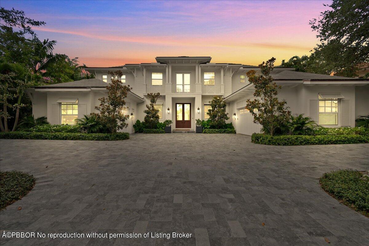 159 Commodore Drive Jupiter, FL 33477 - Photo 16 of 20 a front view of a house with garden