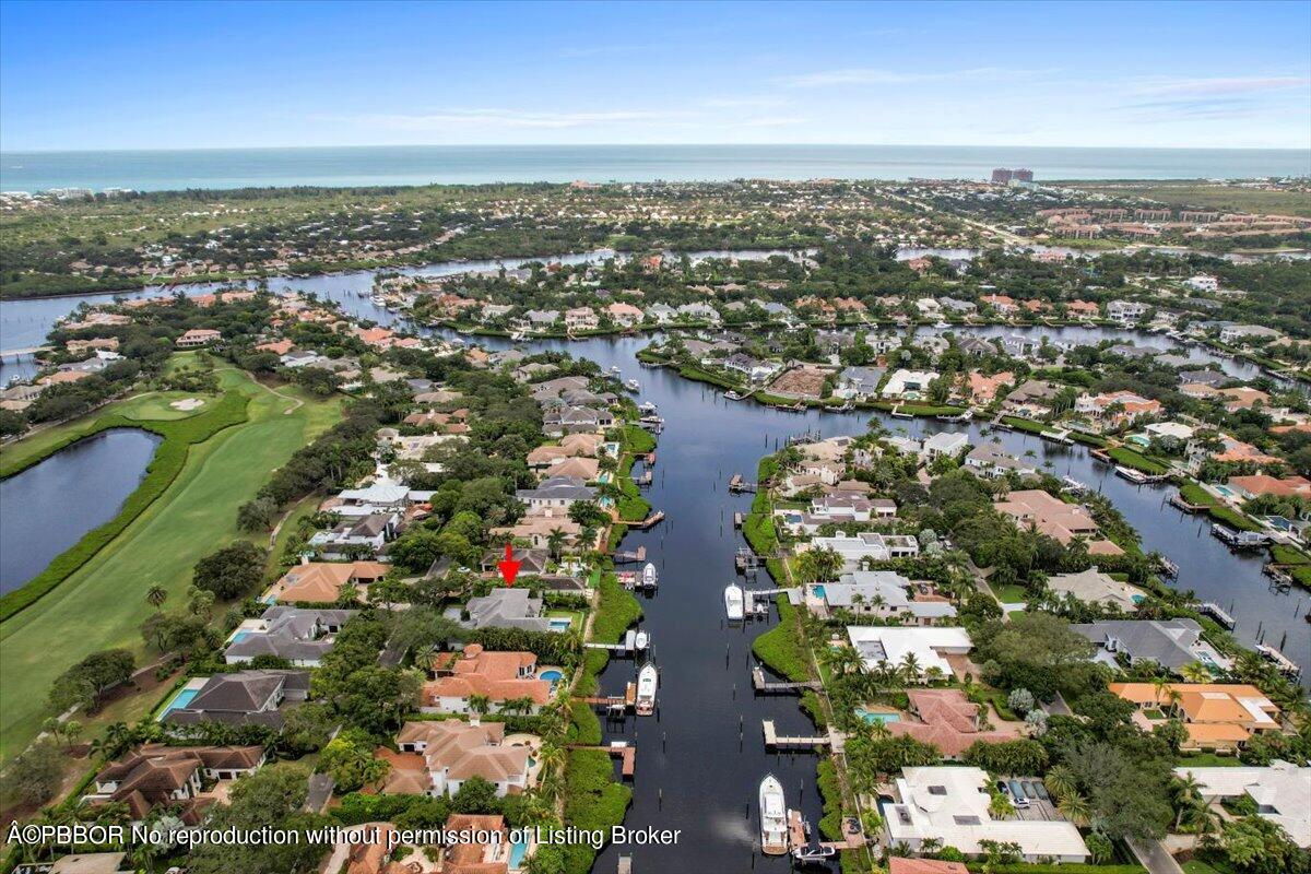 159 Commodore Drive Jupiter, FL 33477 - Photo 18 of 20 an aerial view of city and lake