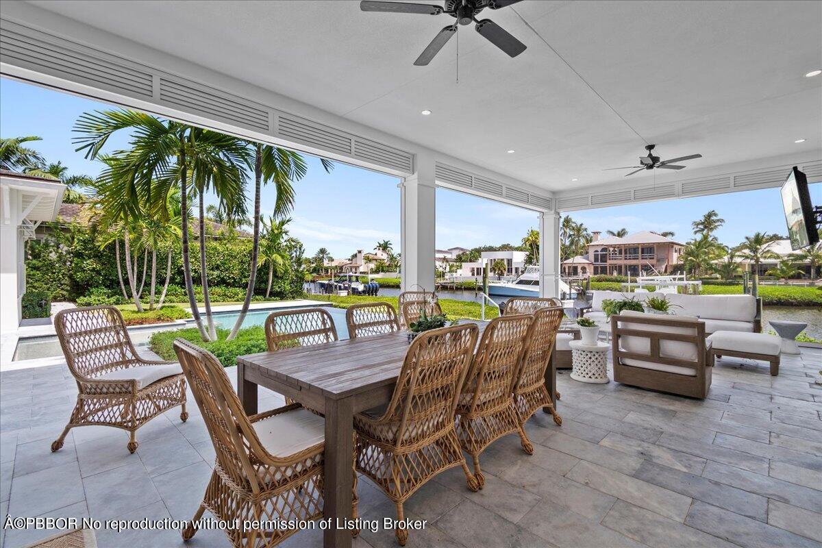 159 Commodore Drive Jupiter, FL 33477 - Photo 4 of 20 a view of a dining room with furniture window and outside view