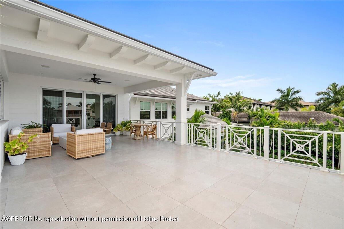 159 Commodore Drive Jupiter, FL 33477 - Photo 8 of 20 a bedroom with furniture and garden