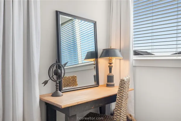 a bathroom with a sink and a window