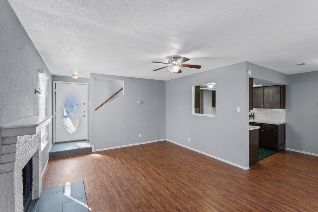 9203 Kempler Drive, Unit B Austin, TX 78748 - Photo 1 of 26 a view of a kitchen with a sink cabinets and wooden floor