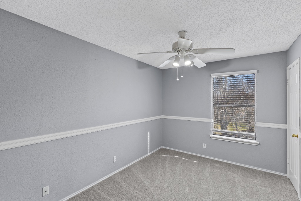 9203 Kempler Drive, Unit B Austin, TX 78748 - Photo 16 of 26 a view of an empty room with a window