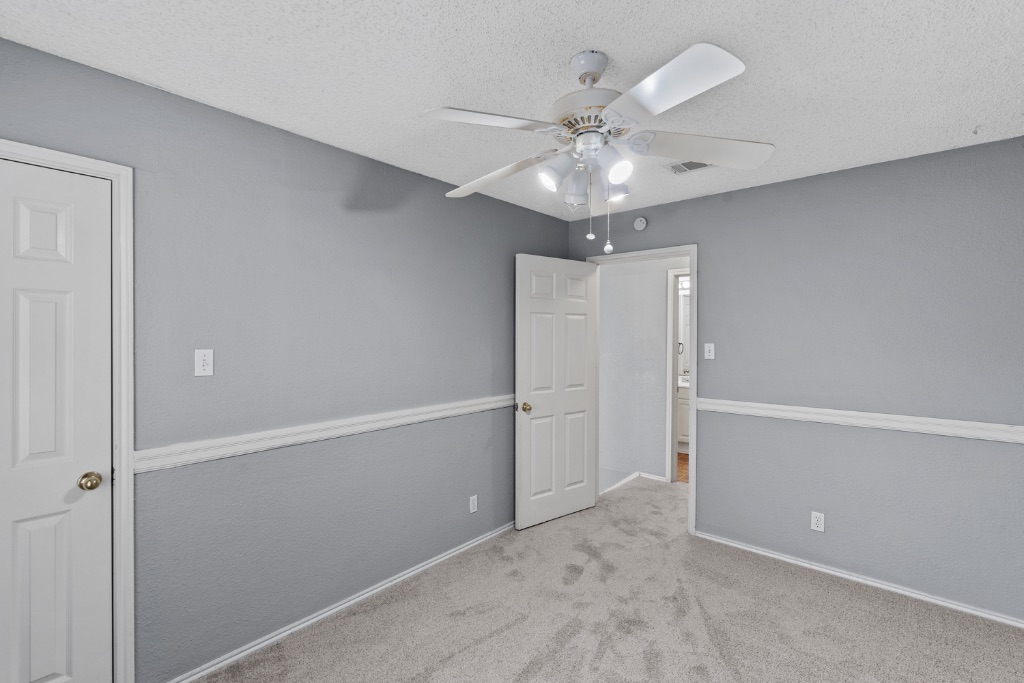 9203 Kempler Drive, Unit B Austin, TX 78748 - Photo 17 of 26 wooden floor in an empty room