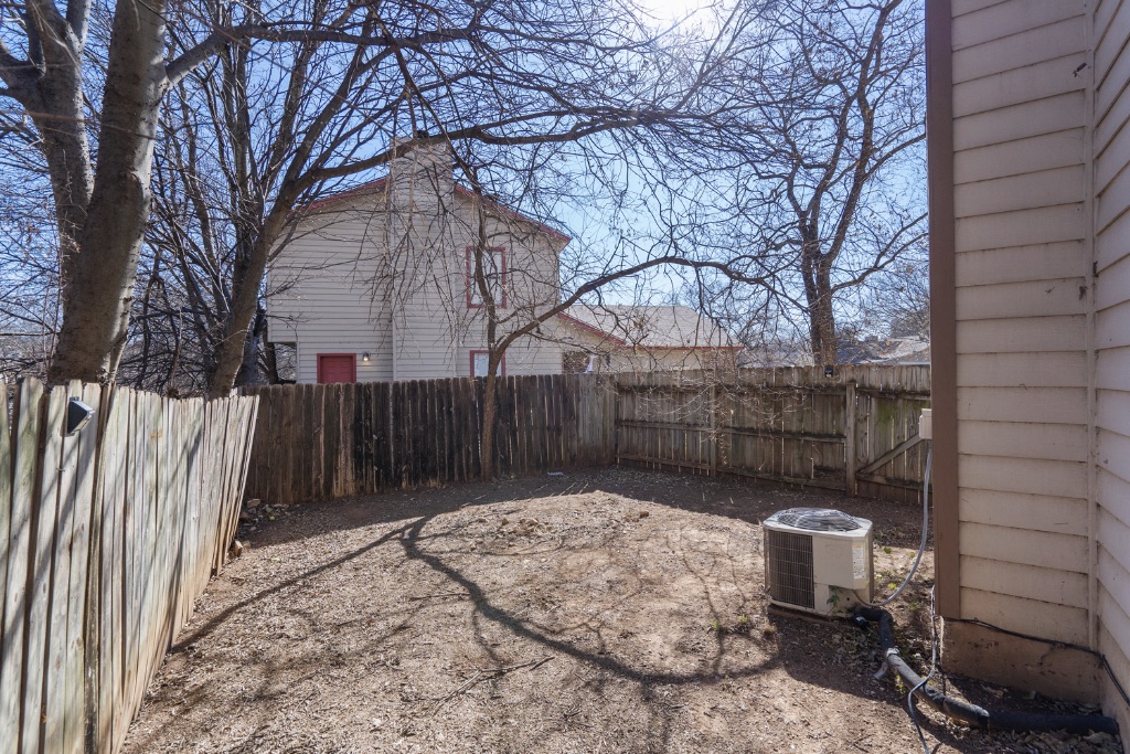 9203 Kempler Drive, Unit B Austin, TX 78748 - Photo 25 of 26 a view of a backyard