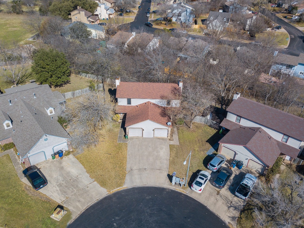 9203 Kempler Drive, Unit B Austin, TX 78748 - Photo 4 of 26 an aerial view of residential house with outdoor space and parking