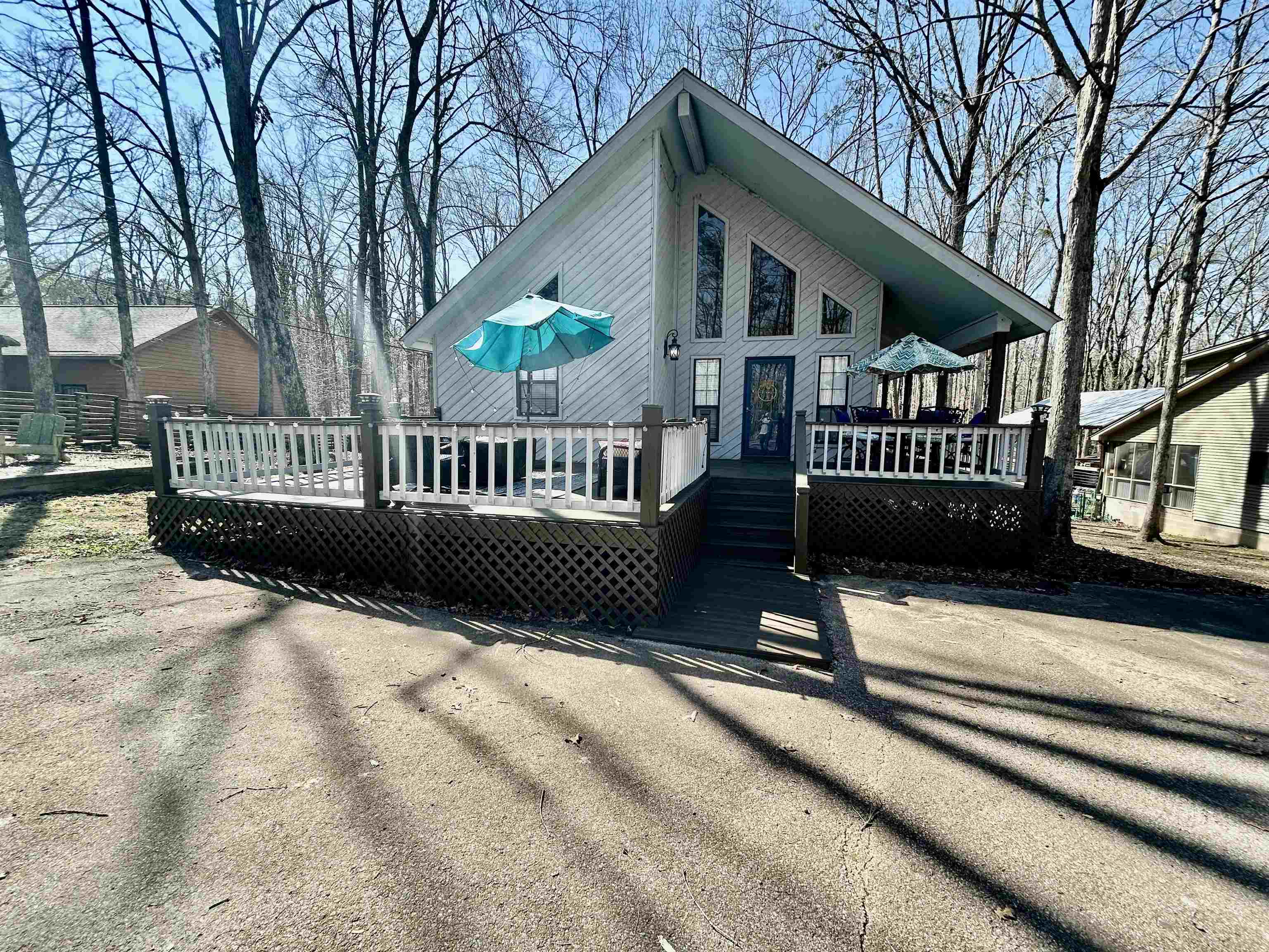 95 Blade Bay, Unit BAY Counce, TN 38326 - Photo 1 of 21 a view of a house with a deck