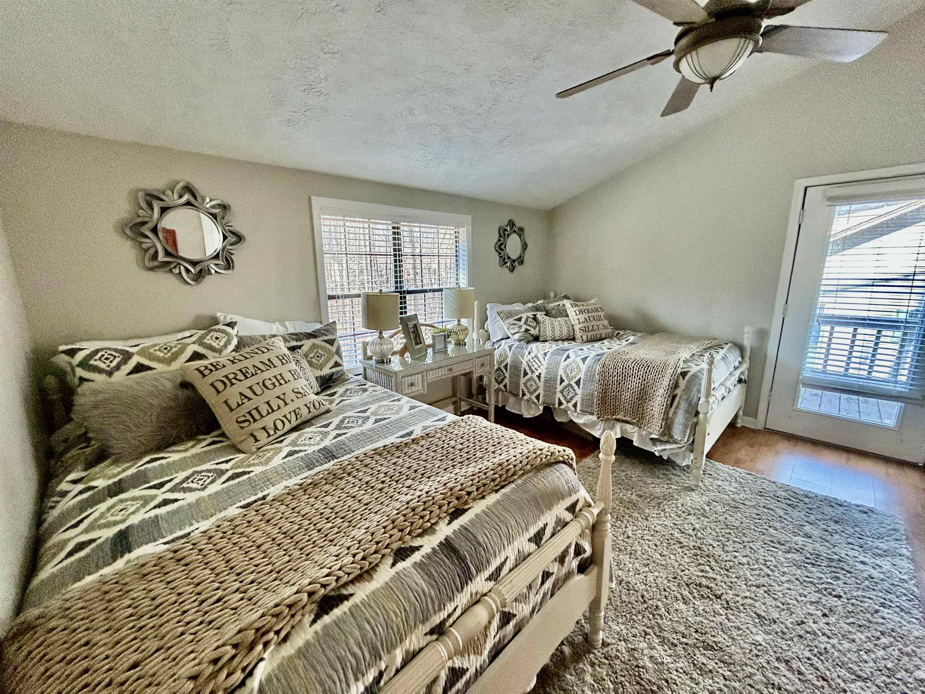 95 Blade Bay, Unit BAY Counce, TN 38326 - Photo 12 of 21 a bedroom with two beds and a window