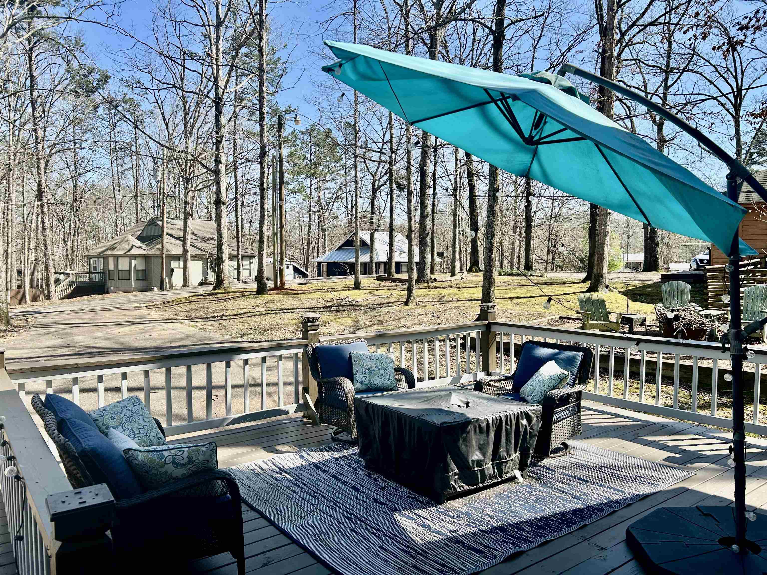 95 Blade Bay, Unit BAY Counce, TN 38326 - Photo 16 of 21 a balcony with furniture and umbrella
