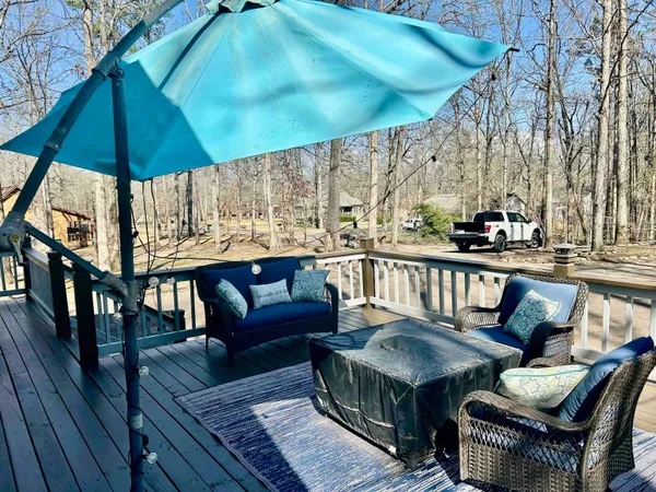 a view of balcony with furniture