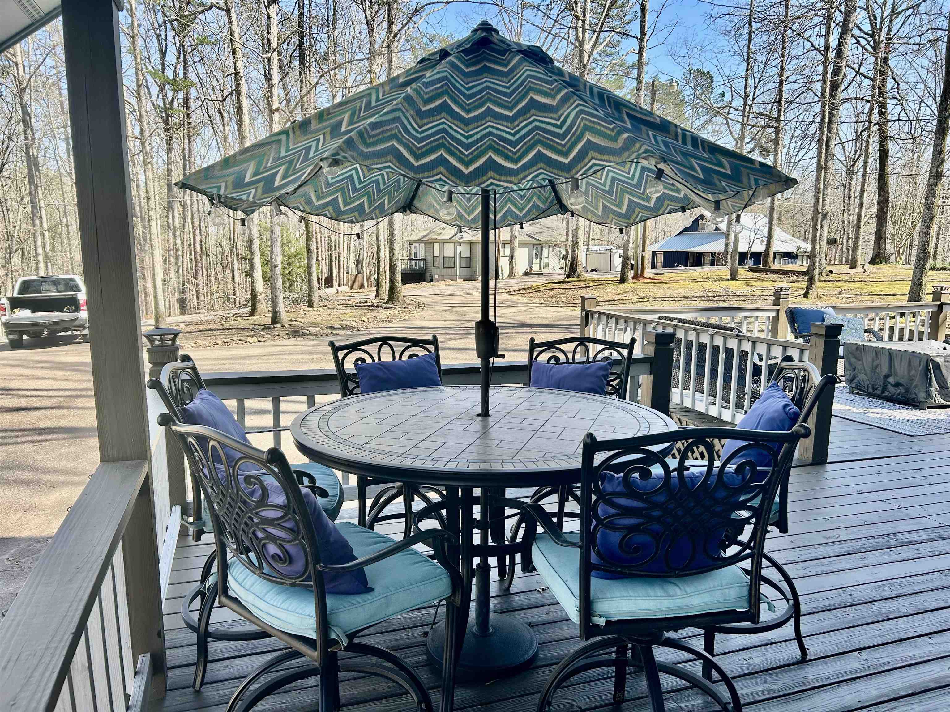 95 Blade Bay, Unit BAY Counce, TN 38326 - Photo 18 of 21 an outdoor space with furniture and umbrella