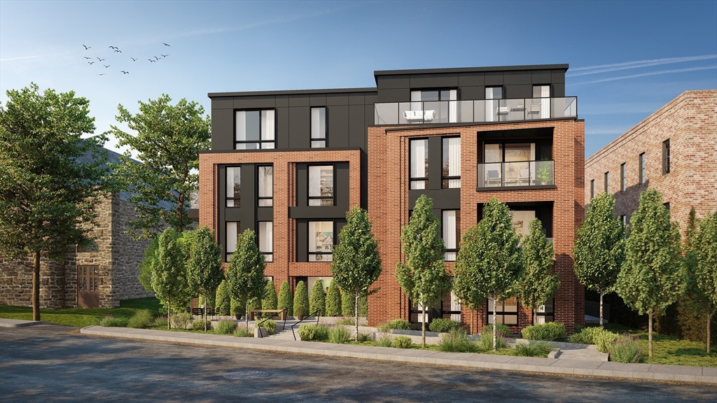 80 Vernon Street, Unit 1A Brookline, MA 02446 - Photo 2 of 9 a front view of residential houses with street