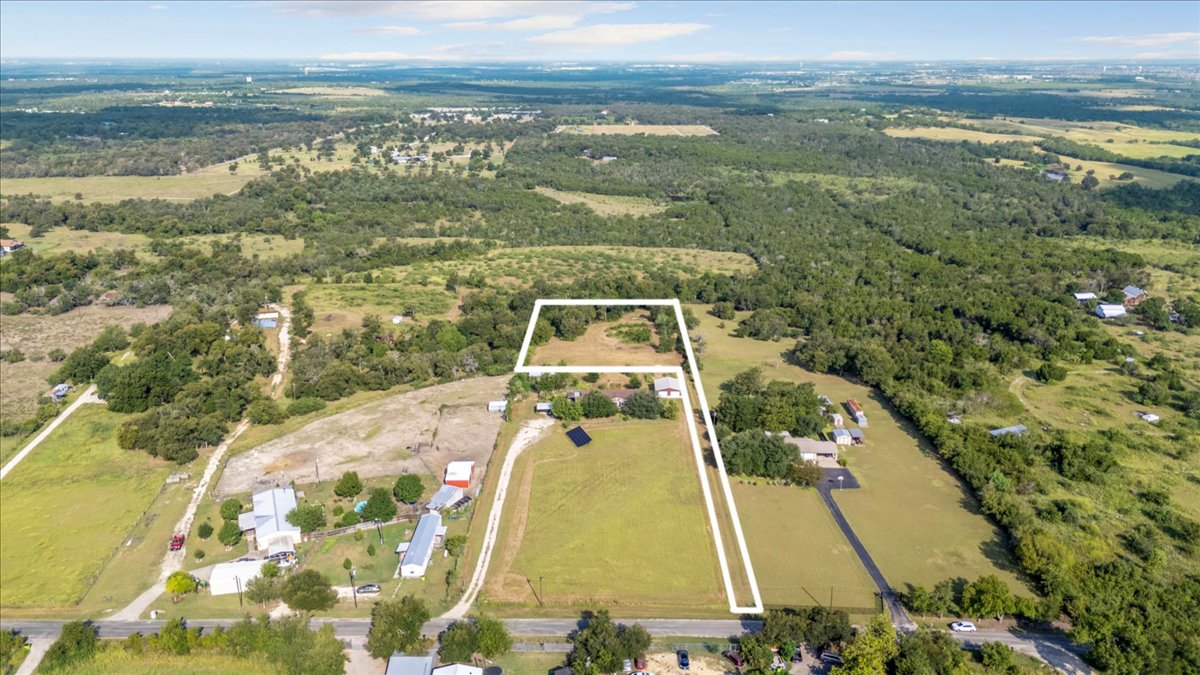 Tbd Hibbs Lane Manor, TX 78653 - Photo 12 of 12 a view of a lake with a outdoor space