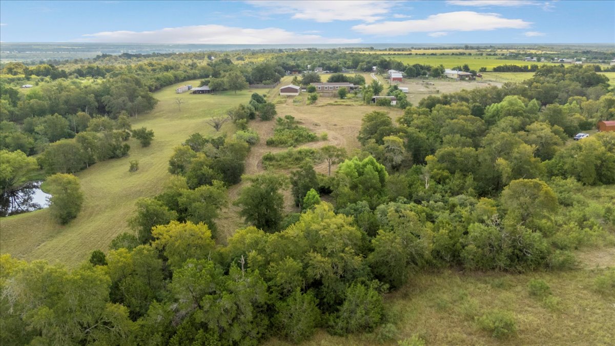 Tbd Hibbs Lane Manor, TX 78653 - Photo 7 of 12 a view of a city with mountains in the background