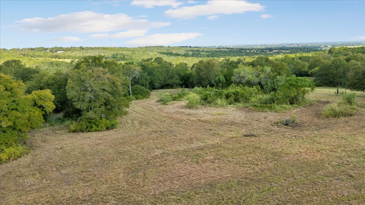Tbd Hibbs Lane Manor, TX 78653 - Photo 8 of 12 a view of a field with an ocean