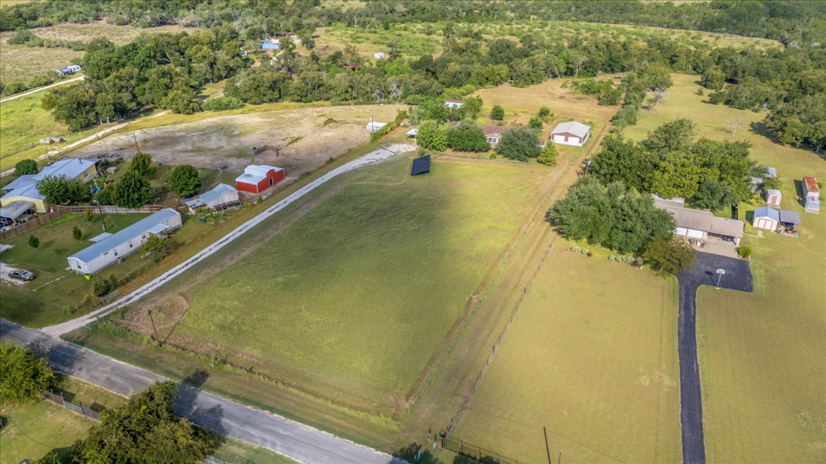 Tbd Hibbs Lane Manor, TX 78653 - Photo 10 of 12 an aerial view of residential houses with outdoor space
