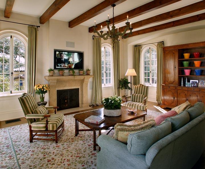 900 Hot Springs Road Santa Barbara, CA 93108 - Photo 12 of 23 a living room with furniture a flat screen tv and a fireplace