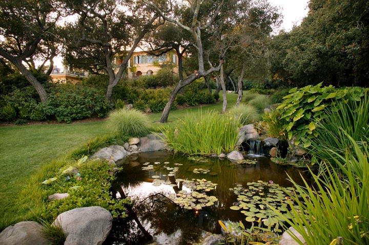 900 Hot Springs Road Santa Barbara, CA 93108 - Photo 18 of 23 a backyard of a house with a yard and outdoor seating