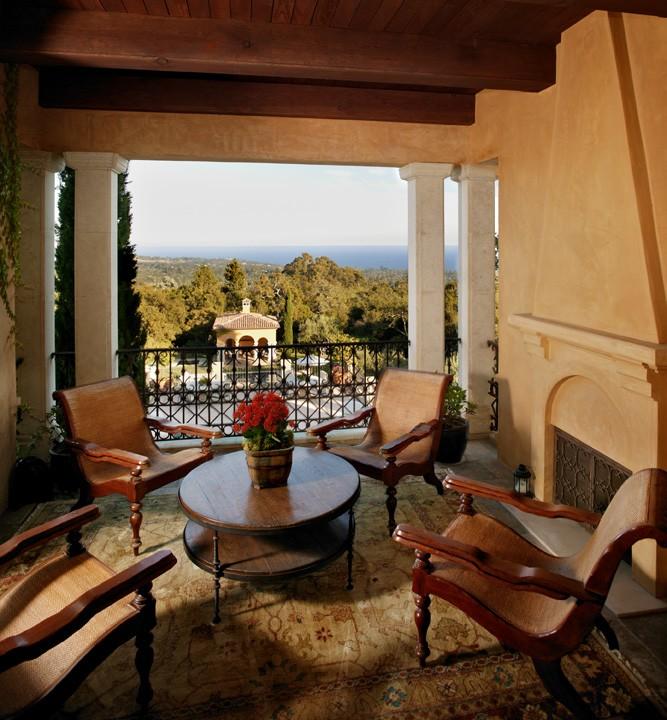 900 Hot Springs Road Santa Barbara, CA 93108 - Photo 6 of 23 a living room with patio furniture and a potted plant