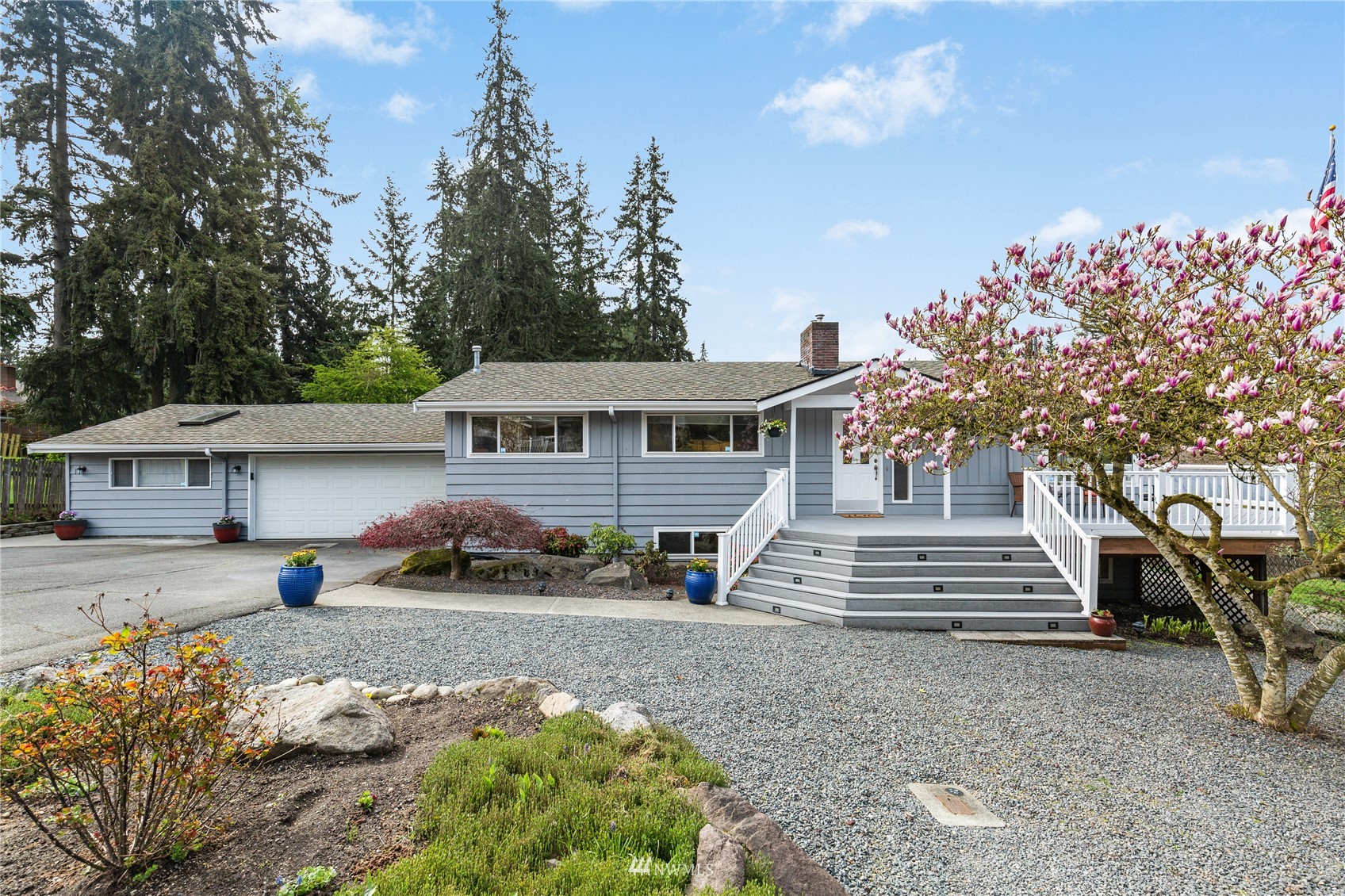504 240th Street Southwest Bothell, WA 98021 - Photo 1 of 40 a front view of a house with a yard