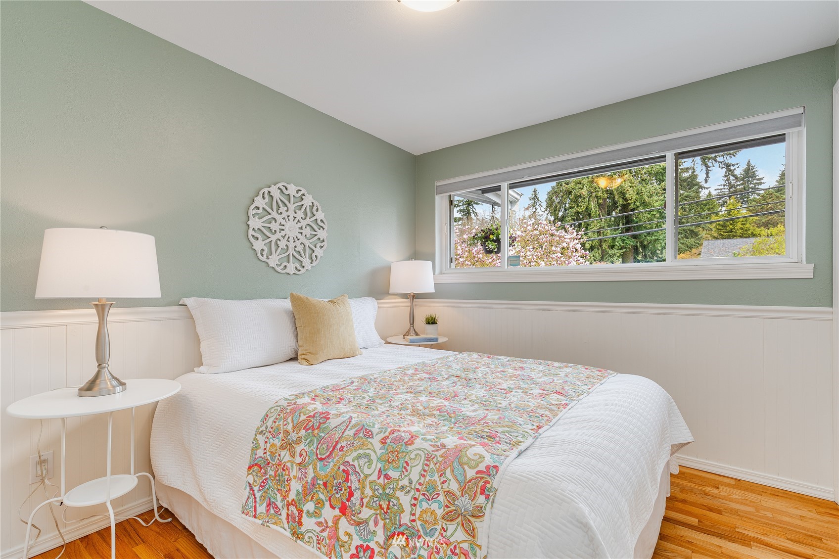 504 240th Street Southwest Bothell, WA 98021 - Photo 17 of 40 a bedroom with a large bed and a window