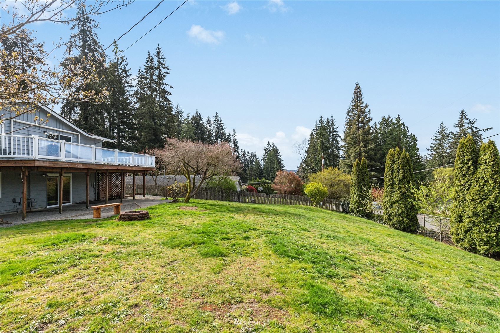 504 240th Street Southwest Bothell, WA 98021 - Photo 33 of 40 a view of a house with a yard and sitting area