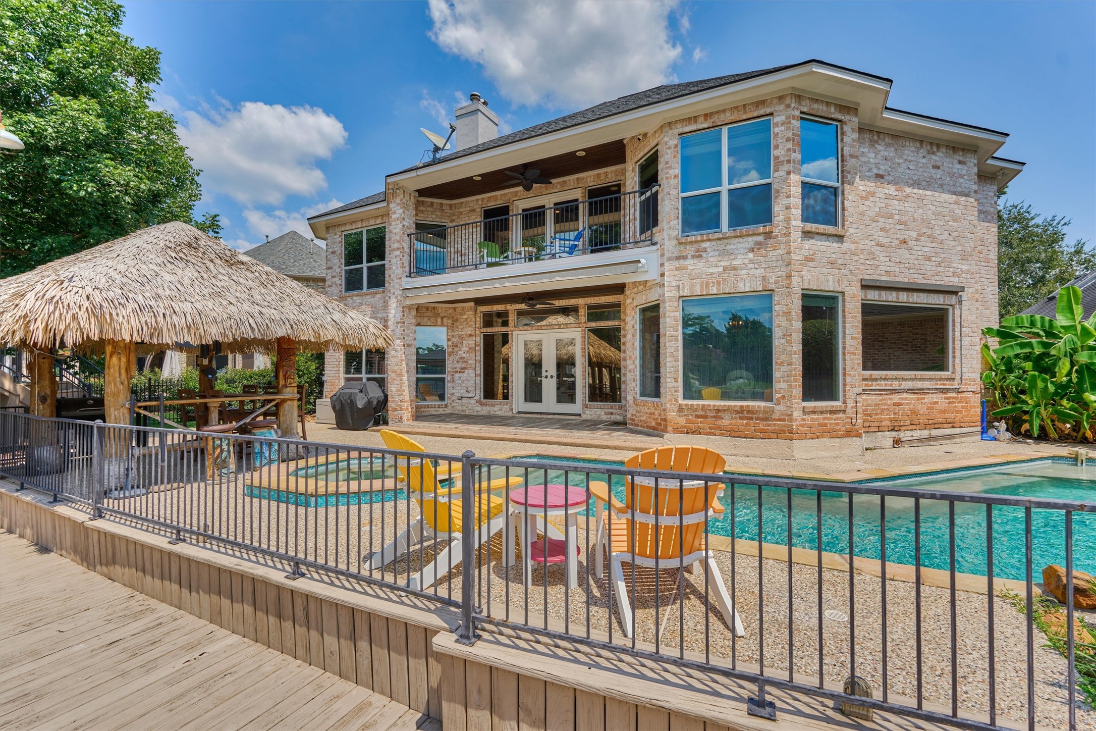 202 Edgemar Road Montgomery, TX 77356 - Photo 41 of 50 Picture music in the air, umbrellas in your cocktails, and the hum of boats drifting across Lake Conroe—vacation living, every day of the year.