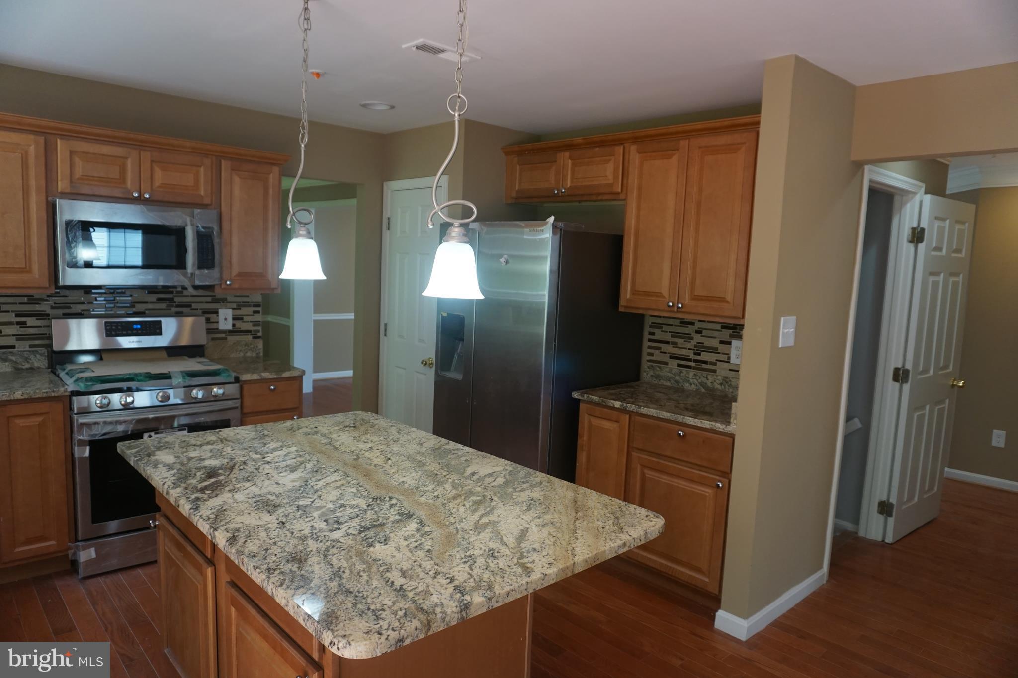 9607 Utica Place Springdale, MD 20721 - Photo 11 of 24 Kitchen