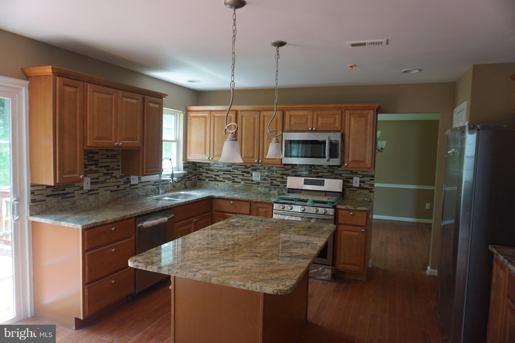 9607 Utica Place Springdale, MD 20721 - Photo 8 of 24 Kitchen