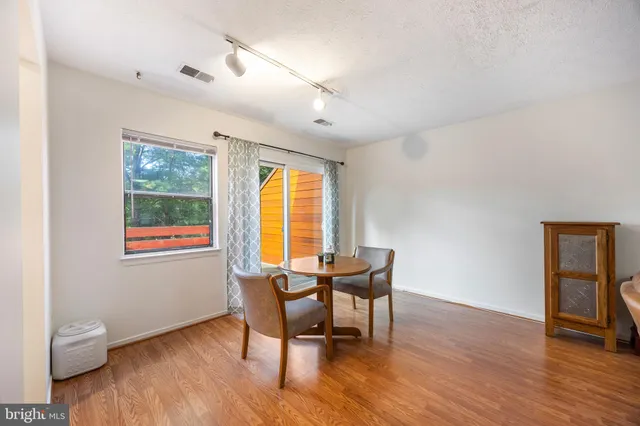 a workspace with furniture and a window
