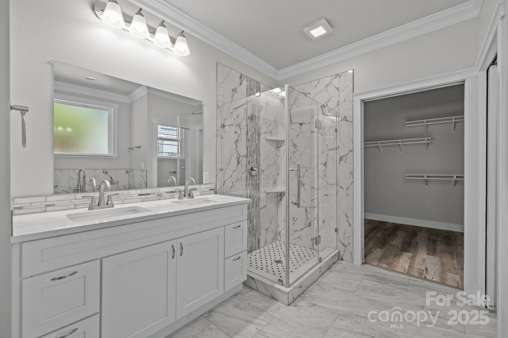 4531 Deer Run Rock Hill, SC 29732 - Photo 18 of 32 a bathroom with a shower sink and mirror