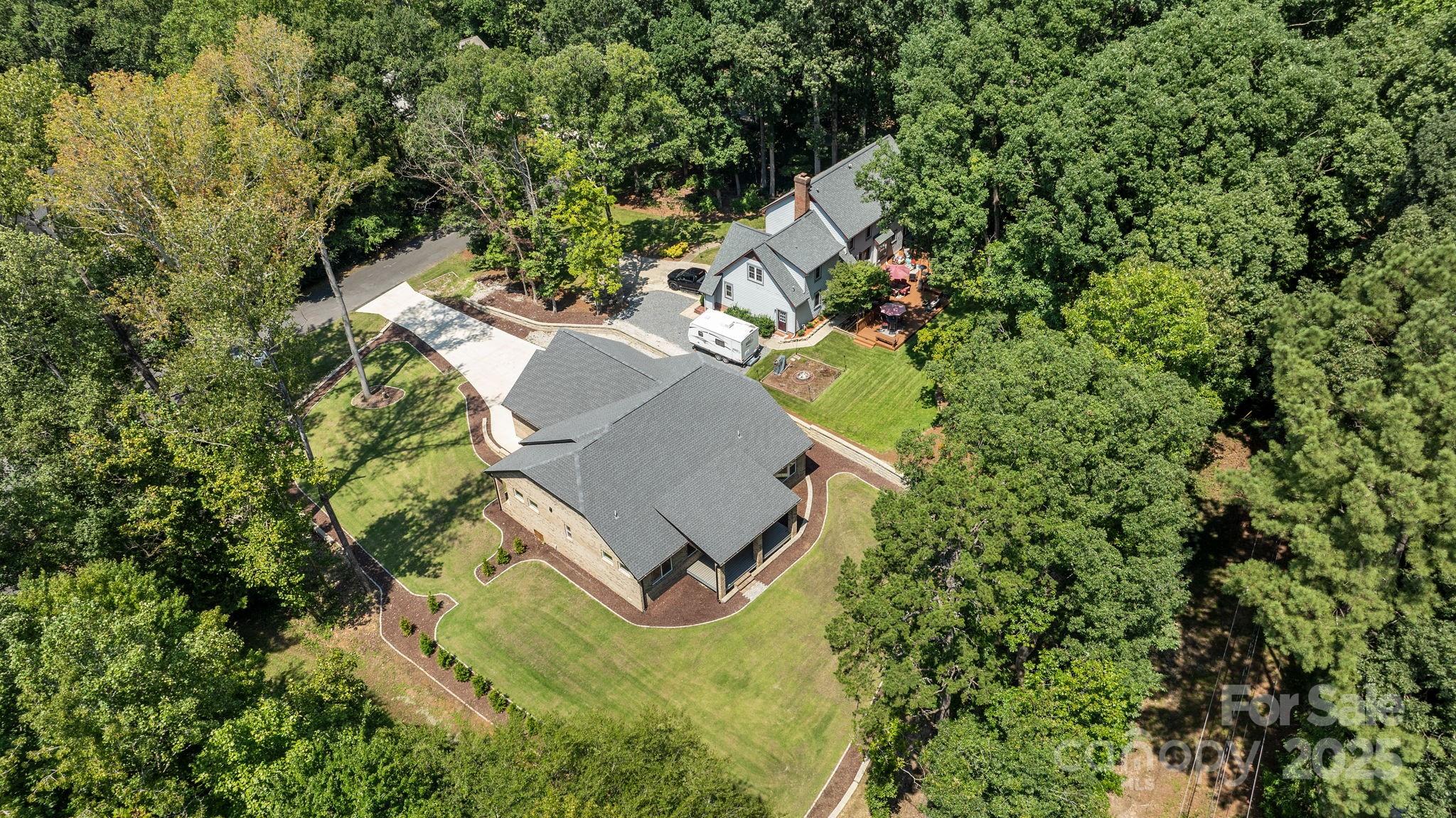 4531 Deer Run Rock Hill, SC 29732 - Photo 31 of 32 an aerial view of a house with a yard and swimming pool