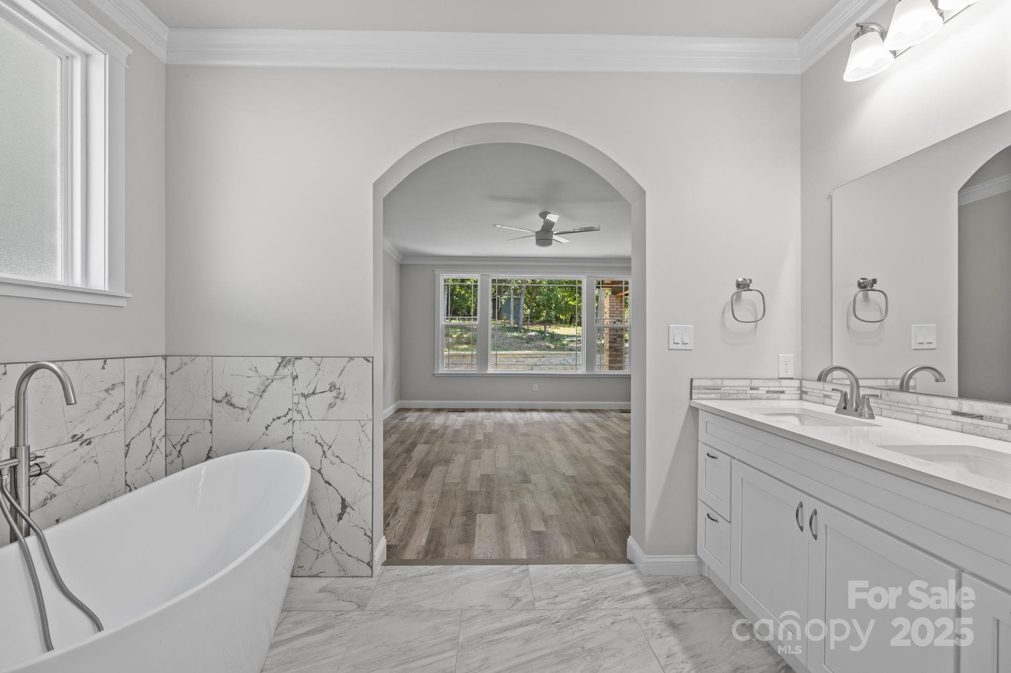 4531 Deer Run Rock Hill, SC 29732 - Photo 8 of 32 a bathroom with a bathtub sink and mirror