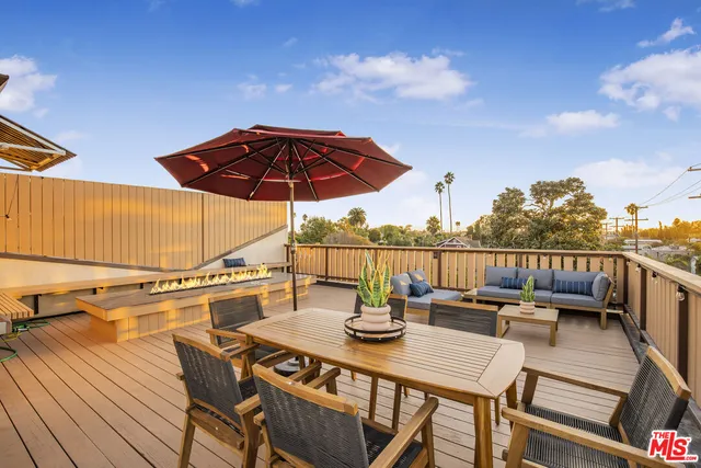 a view of a terrace with furniture