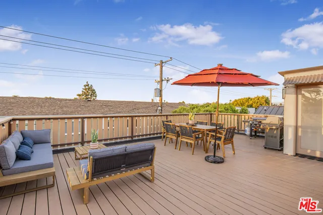a view of a terrace with seating space