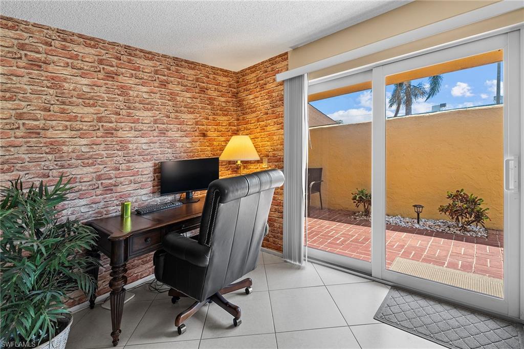 131 Teryl Road, Unit C3 Naples, FL 34112 - Photo 7 of 26 a view of a workspace with furniture