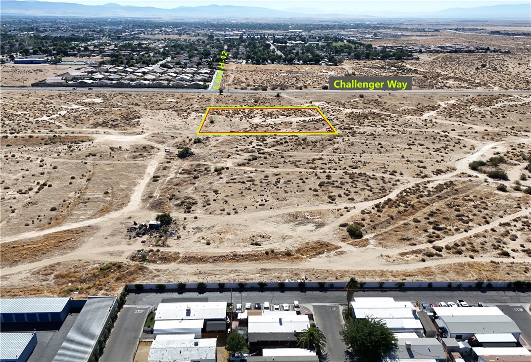 0 11th Street East Lancaster, CA 93535 - Photo 3 of 4 an aerial view of residential houses and outdoor space