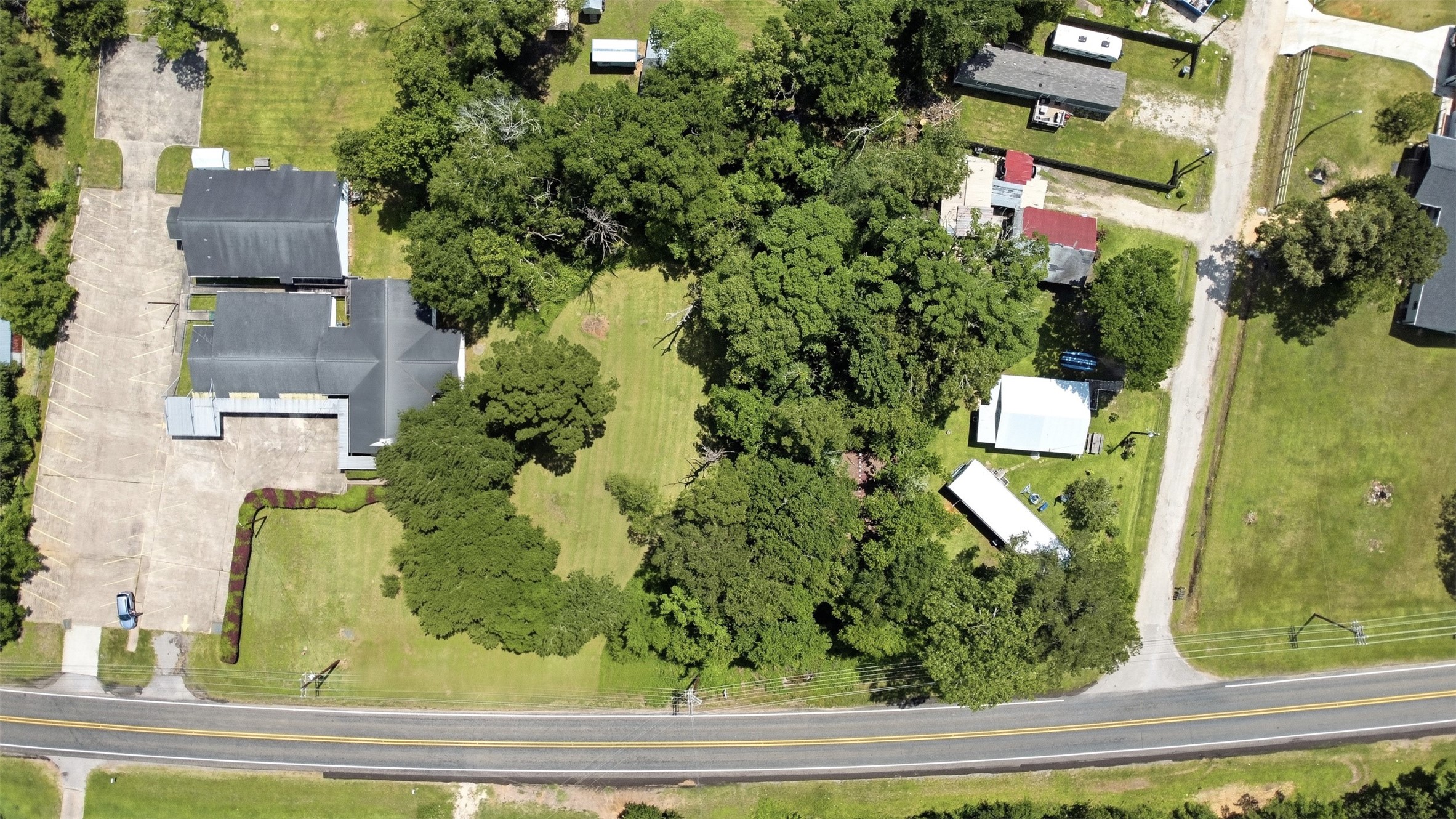 0 State Highway Loop Goodrich, TX 77335 - Photo 18 of 22 an aerial view of residential houses with outdoor space