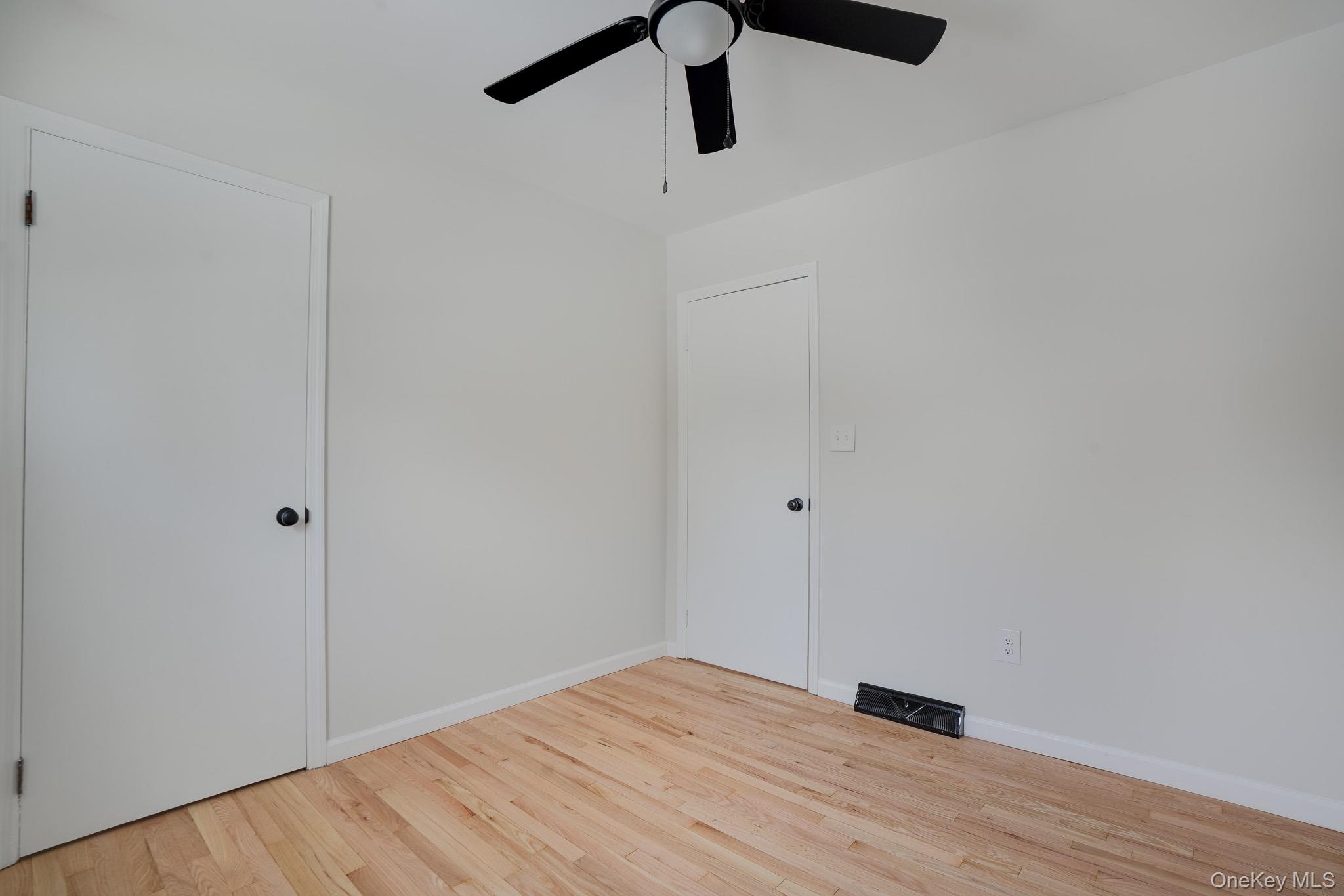 629 Twin Arch Road Rock Tavern, NY 12575 - Photo 11 of 24 a view of empty room with wooden floor