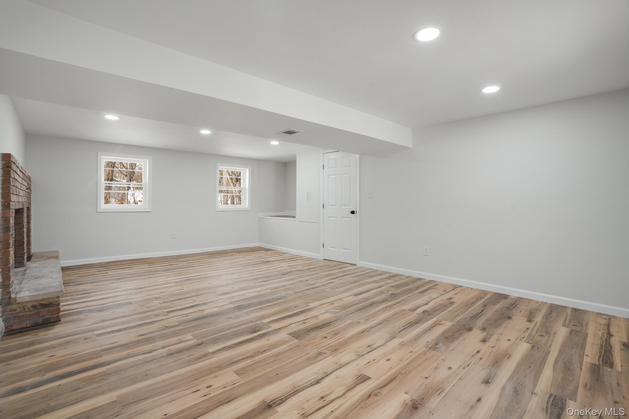629 Twin Arch Road Rock Tavern, NY 12575 - Photo 20 of 24 a view of empty room with wooden floor and fan