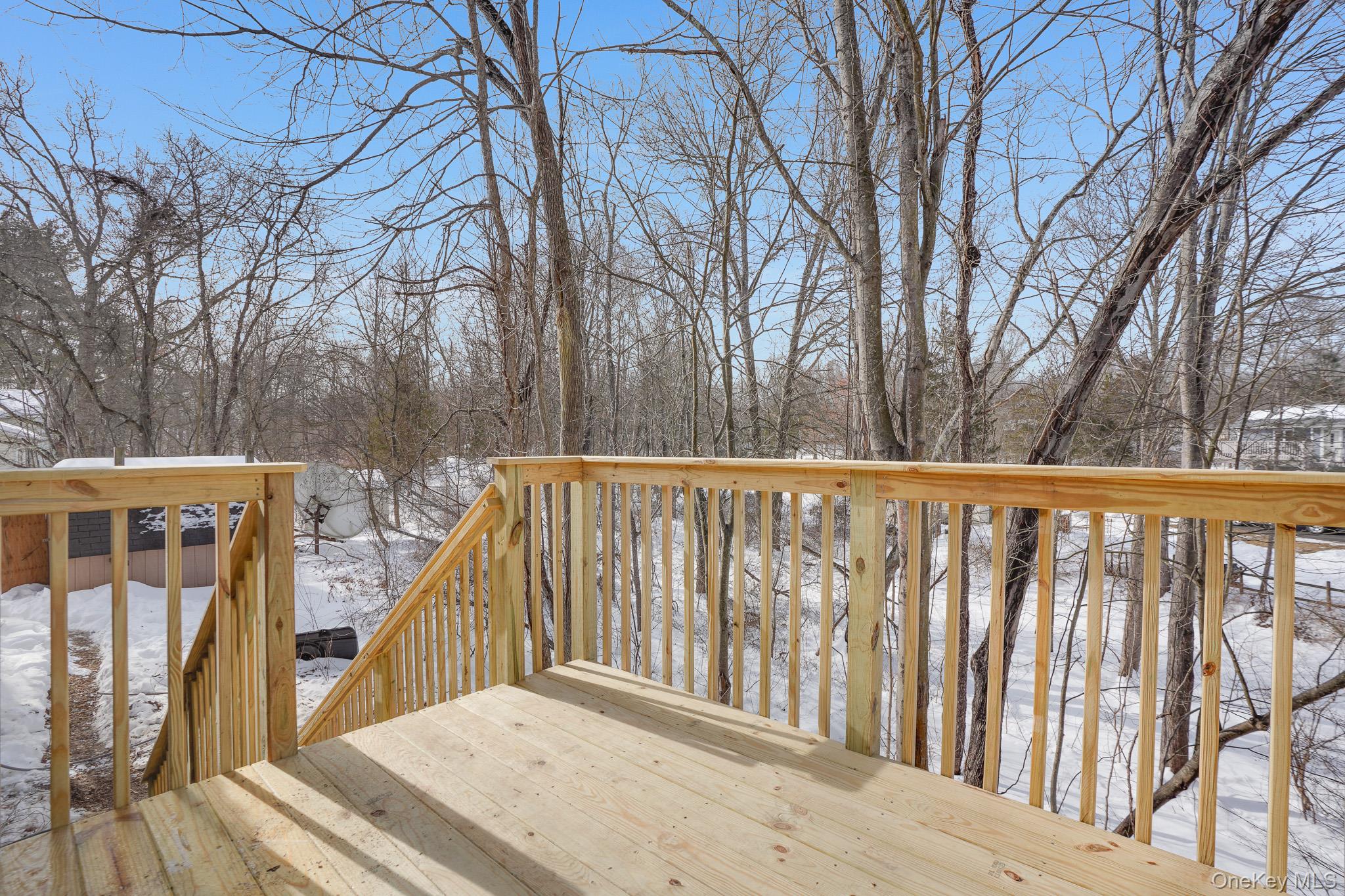 629 Twin Arch Road Rock Tavern, NY 12575 - Photo 24 of 24 a view of balcony with wooden floor and fence