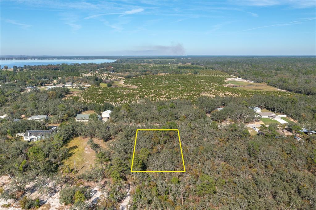 0 Deer Road Frostproof, FL 33843 - Photo 5 of 10 an aerial view of residential houses with outdoor space