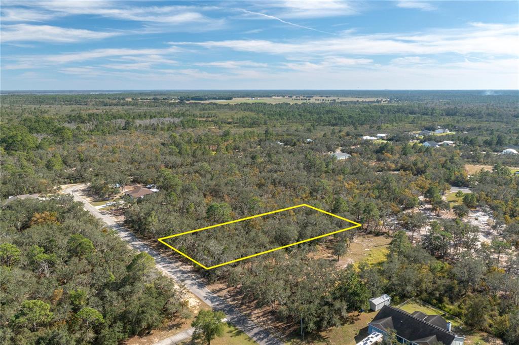 0 Deer Road Frostproof, FL 33843 - Photo 7 of 10 an aerial view of residential house with outdoor space