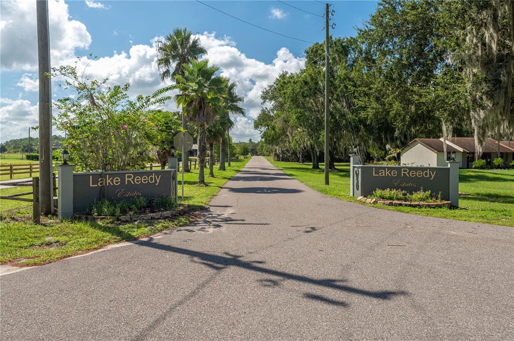 0 Deer Road Frostproof, FL 33843 - Photo 9 of 10 a front view of a house with garden